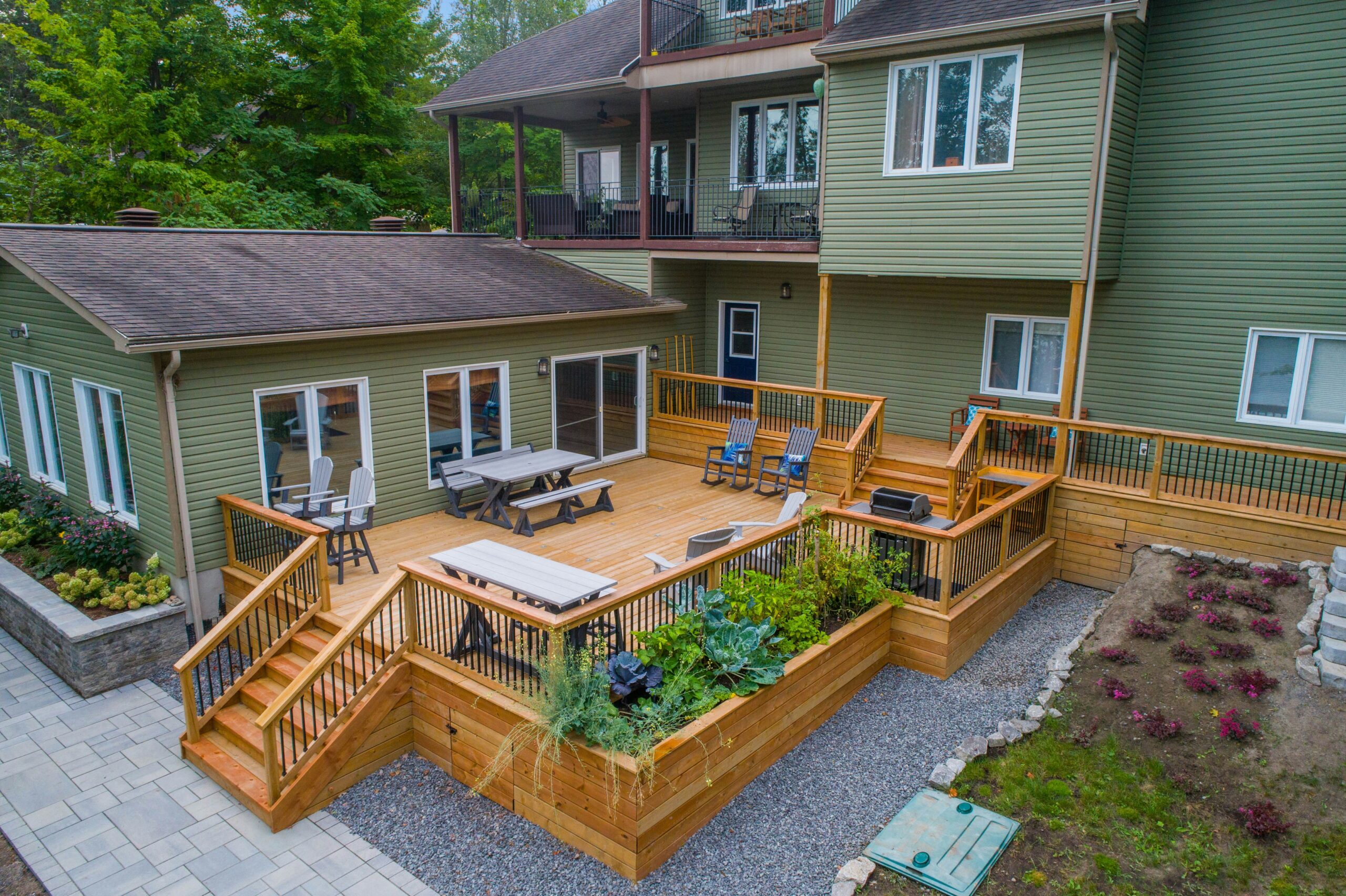 Custom wooden deck construction in backyard